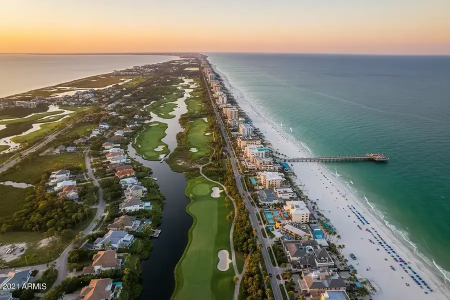 Choosing Between Clearwater Beach and Palm Harbor: A Complete Neighborhood Comparison