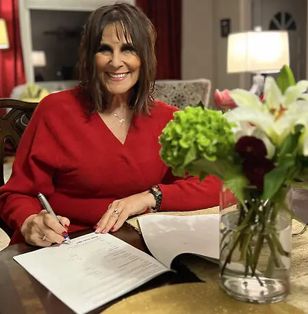 Signing my book publishing contract with Redemption Press. 